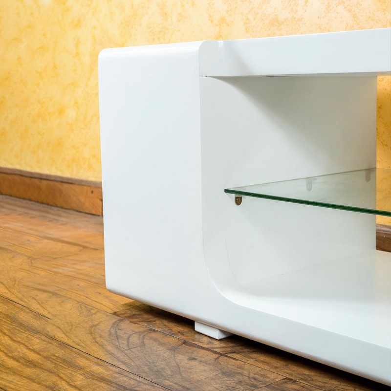 Your living room arrangement is incomplete without a TV stand, Revamp your space with this contemporary style white corral TV stand. This design also lends your space a rich look while highlighting all the features of modern detailing. Featuring a 60” TV with a strong top and a tempered glass shelf with a bottom shelf to match your audio, video, gaming, or decoration needs.