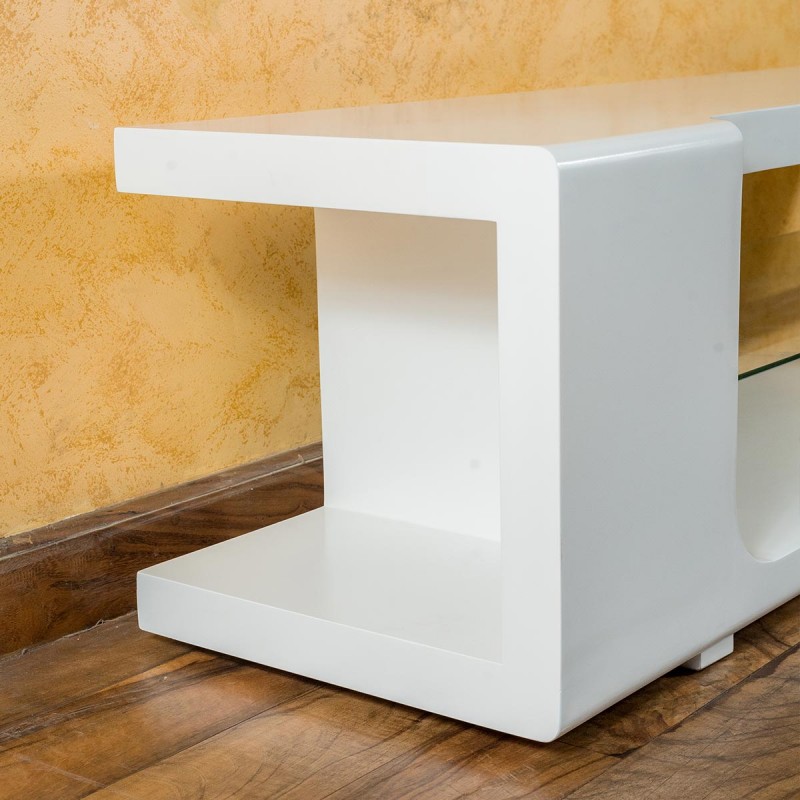 Your living room arrangement is incomplete without a TV stand, Revamp your space with this contemporary style white corral TV stand. This design also lends your space a rich look while highlighting all the features of modern detailing. Featuring a 60” TV with a strong top and a tempered glass shelf with a bottom shelf to match your audio, video, gaming, or decoration needs.
